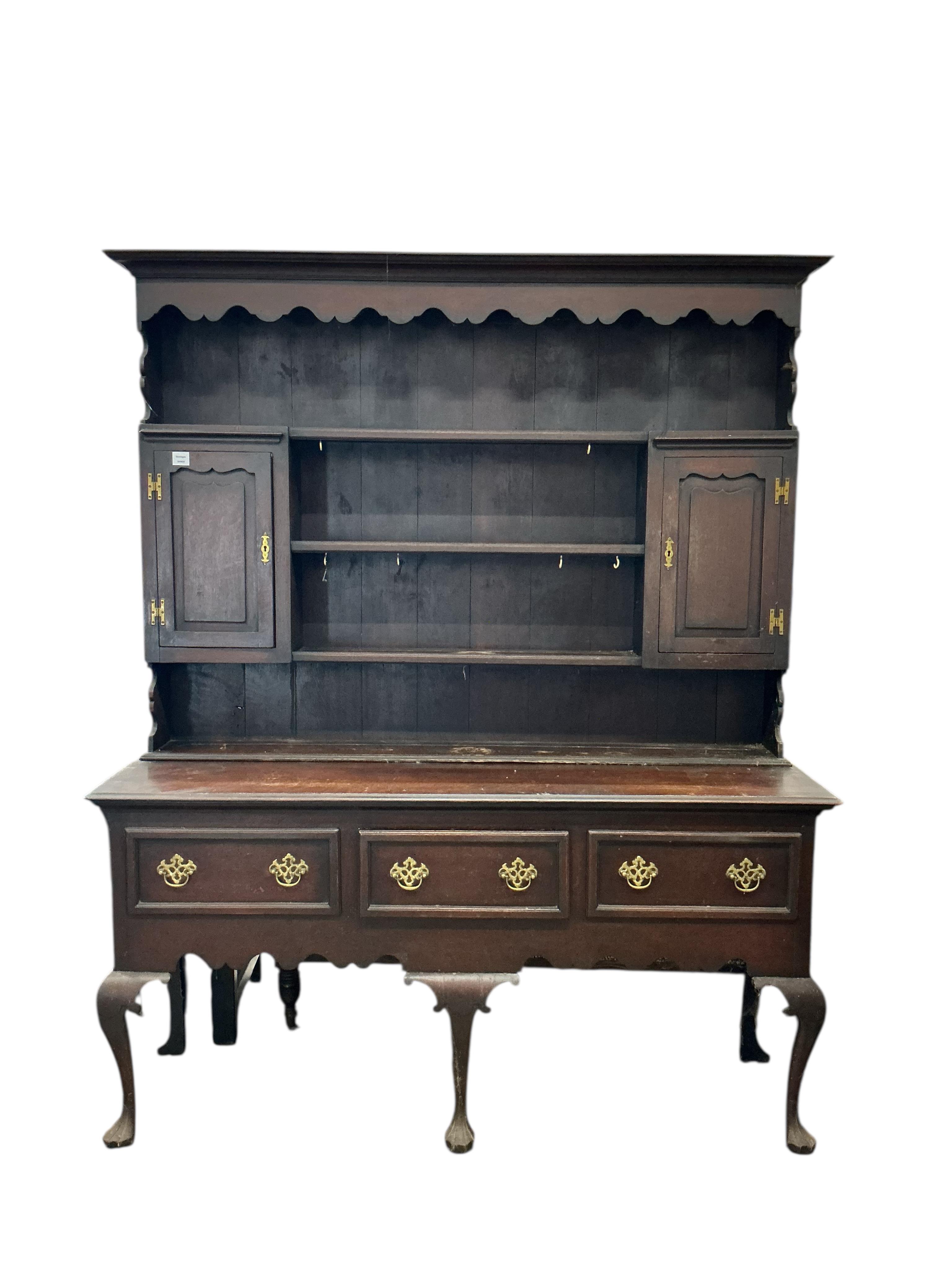 An 18th century style oak dresser, width 168cm, depth 49cm, height 207cm